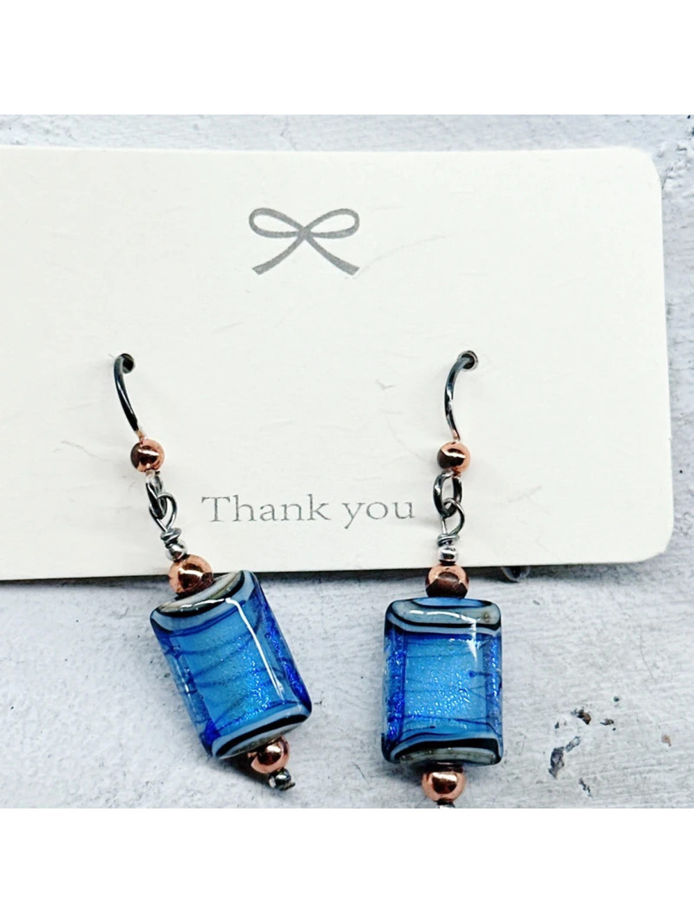 1058mc. Ribbon Blue Glass Earrings